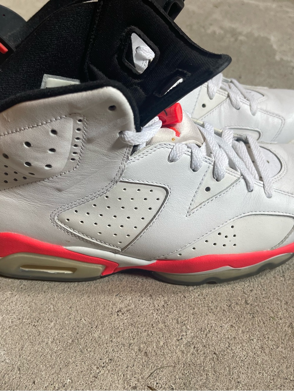 Jordan’s White and Infrared Retro Basketball Sneakers